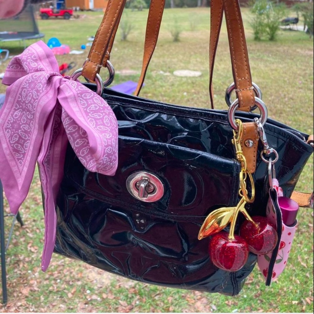 Romantic Charmed black leather Coach Bag